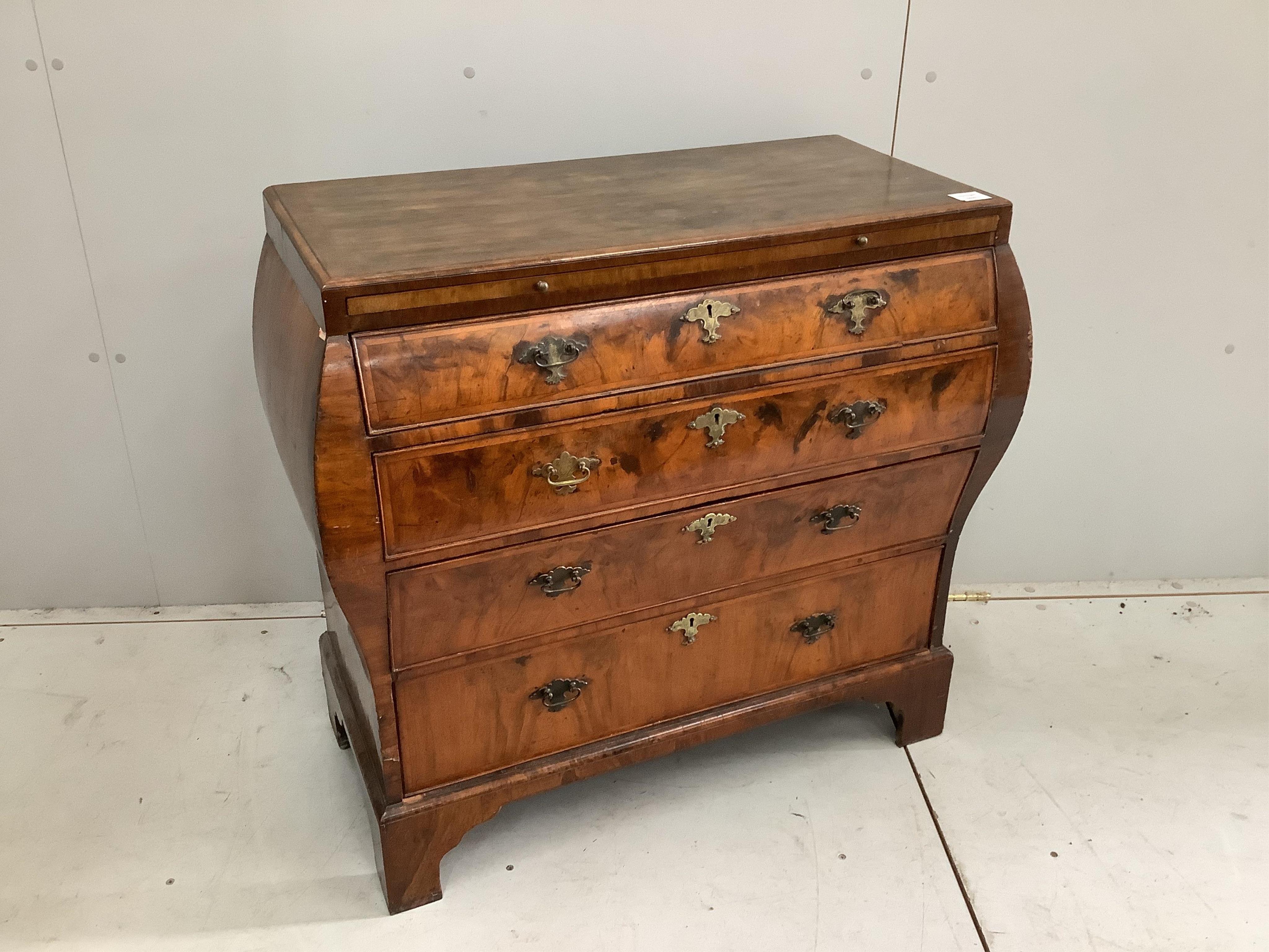 A 19th century and later Dutch bombe walnut chest, width 88cm, height 82cm. Condition - faded top, later alterations, fair